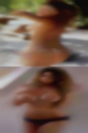 Tall mature woman topless lies
