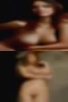 Tall mature woman topless lies