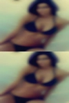 Tall mature woman topless lies